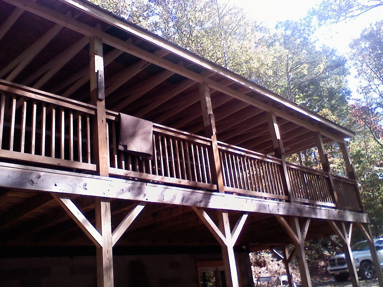 Timber framing under a new elevated porch and deck — Roof Leak Repair in Helix by Roofing Brothers